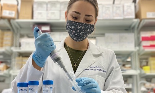 Woman testing samples in a lab